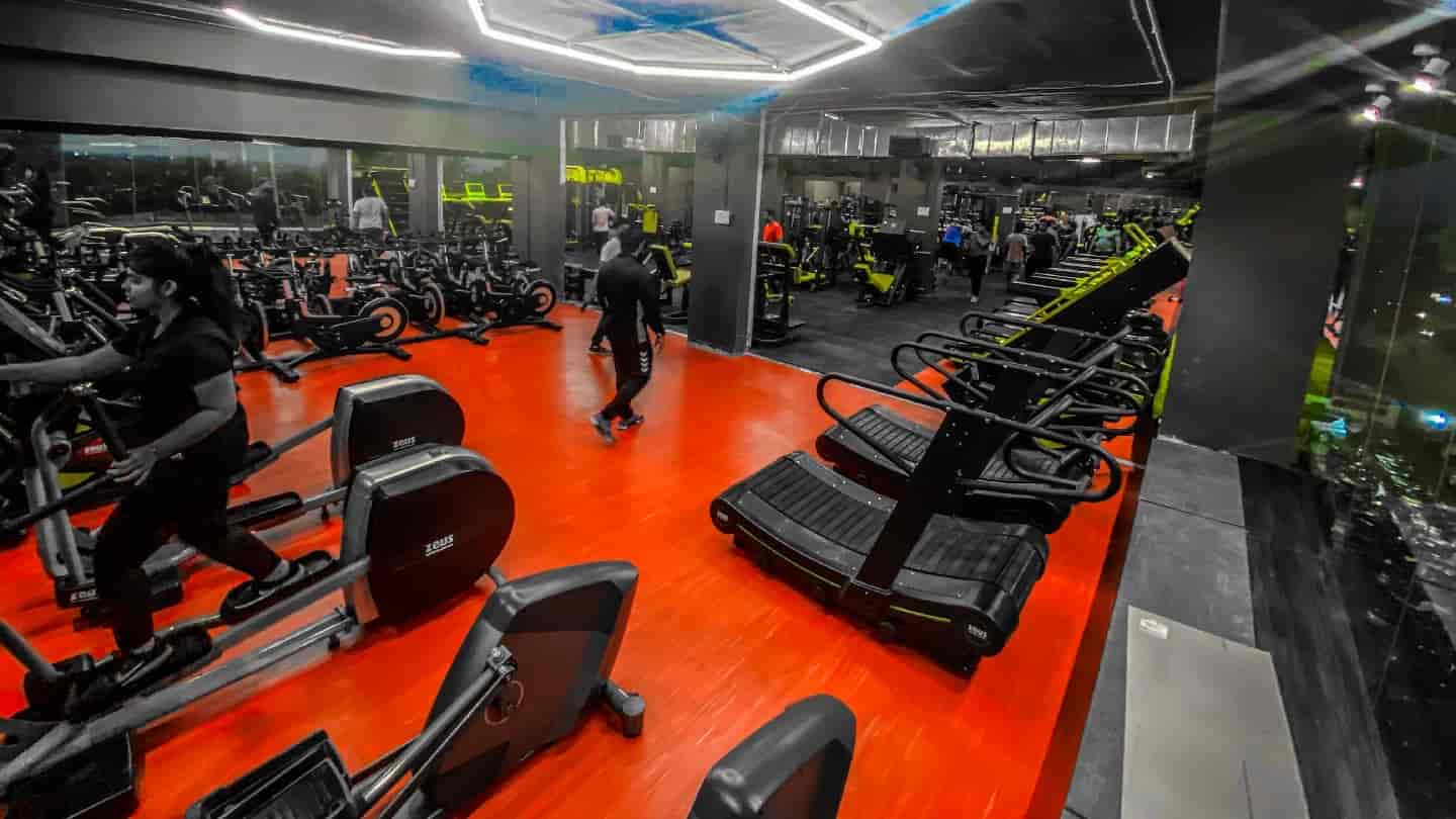 Gym Planet floor with cardio and training equipment